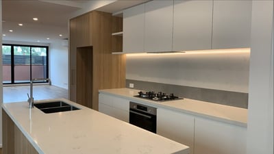 Alt="Completed Camberwell apartment kitchen"