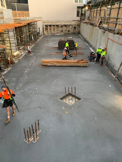 Alt="Ground floor concrete poured at Cornus Carnegie site"