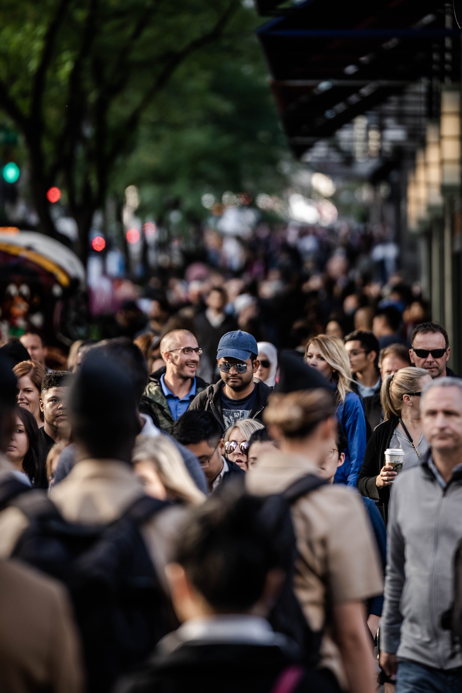 Flock of people walking on the Street in Melbourne 